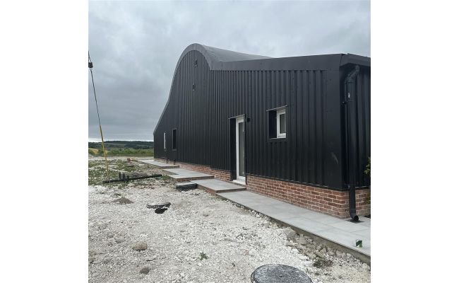 Profile steel sheets supplied by Southern Sheeting for residential Dutch barn conversion